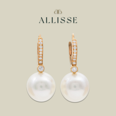 A pair of south sea pearl and diamond earrings by Tiffany & Co.