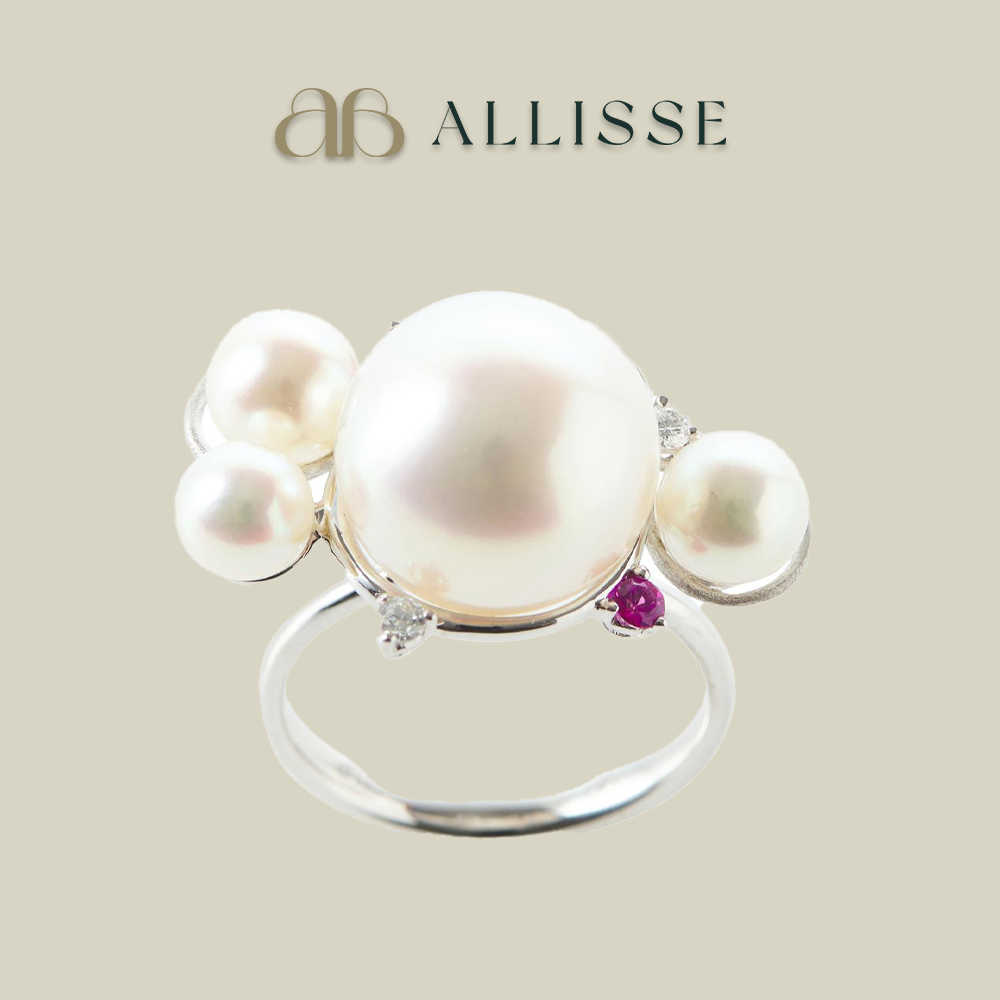 A pearl, sapphire and diamond cluster ring