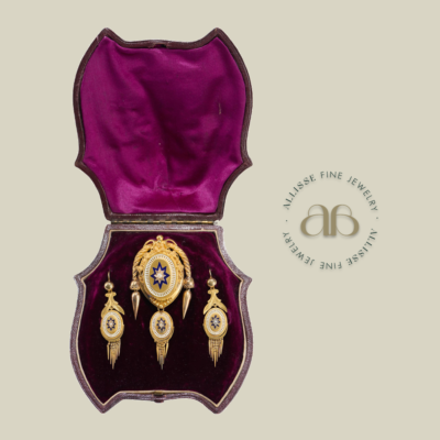 A mid-victorian 18ct gold, enamel and seed pearl demi-parure