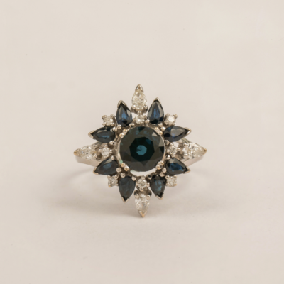 A sapphire and diamond cluster ring